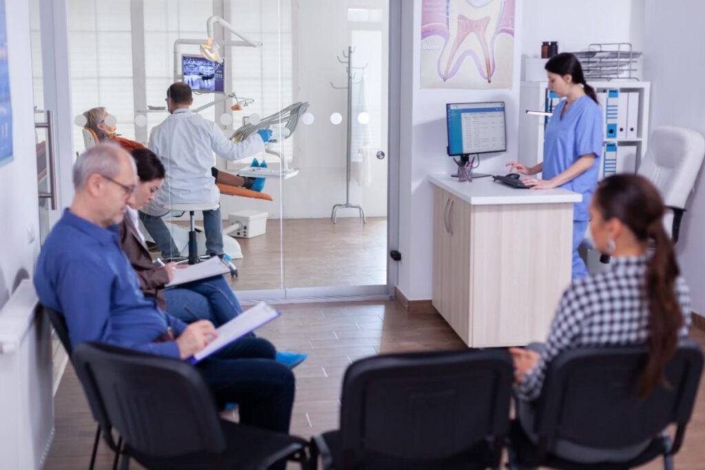 Patients waiting in dental clinic reception area